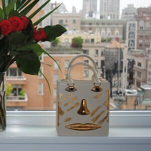 Schiaparelli HANDPRINT Anatomy Jewelry Bag in Gold Foil
